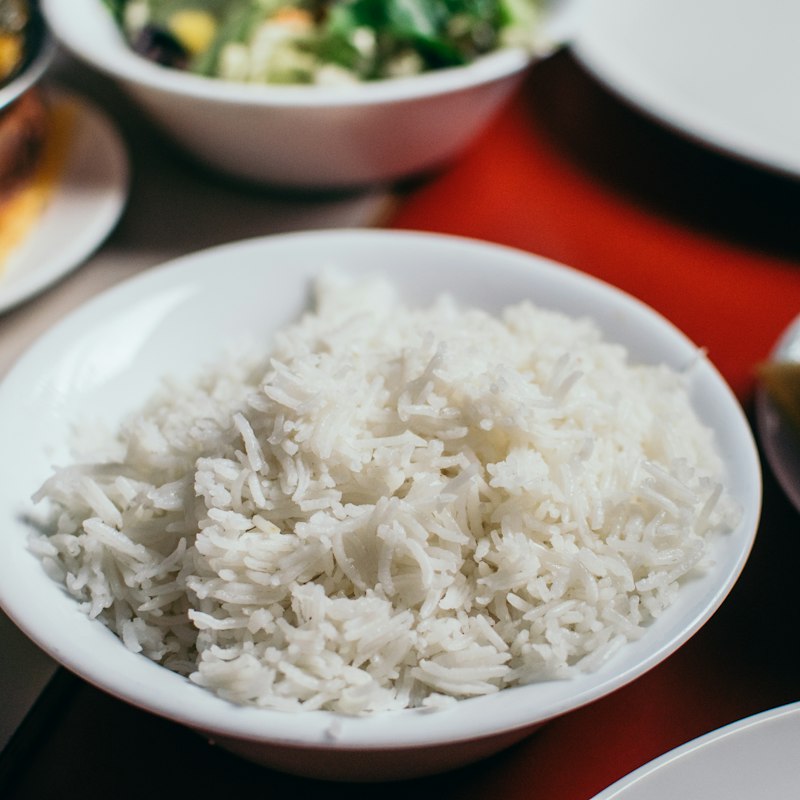 A bowl of plain boiled basmati rice, the grains long and separate